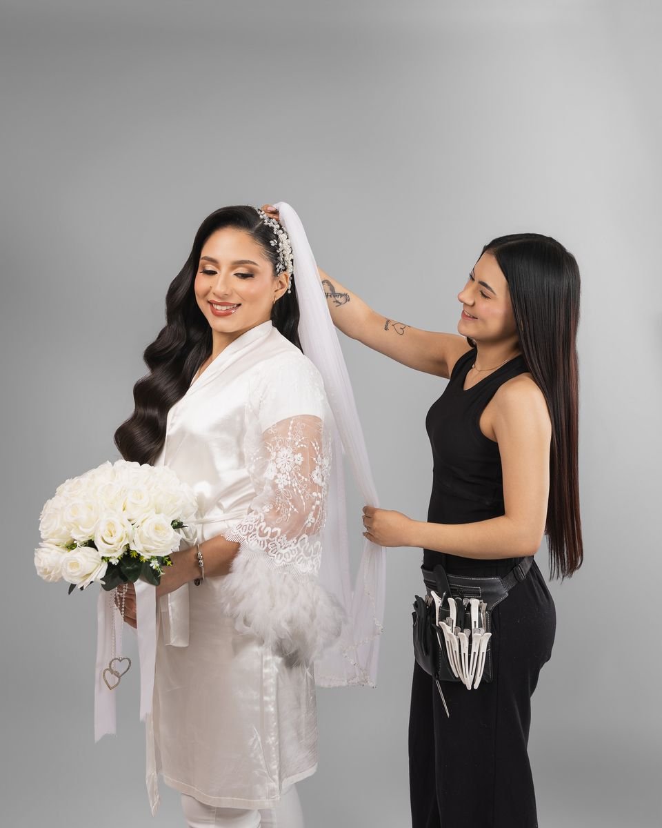 Isabel placing the bride's veil